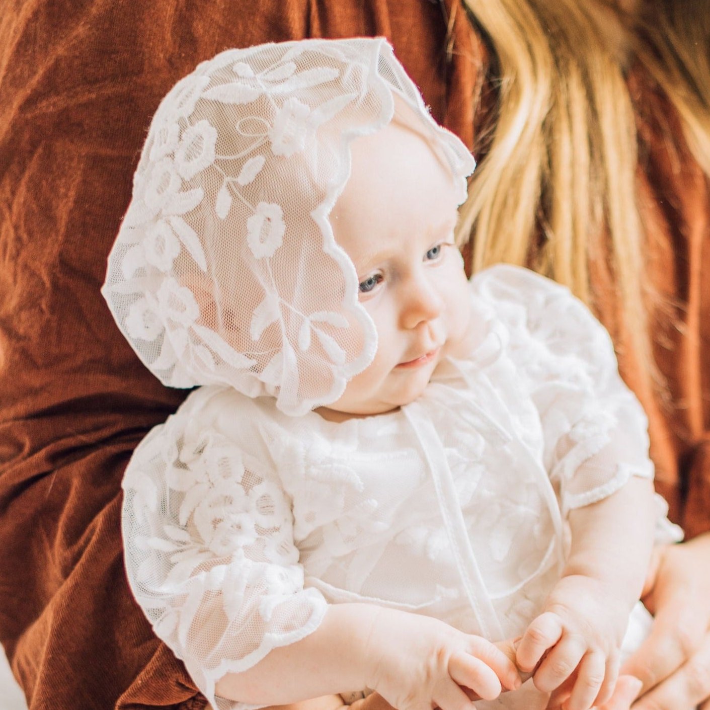 The Symbolism Behind White Christening Gowns & Baby Blessing Attire