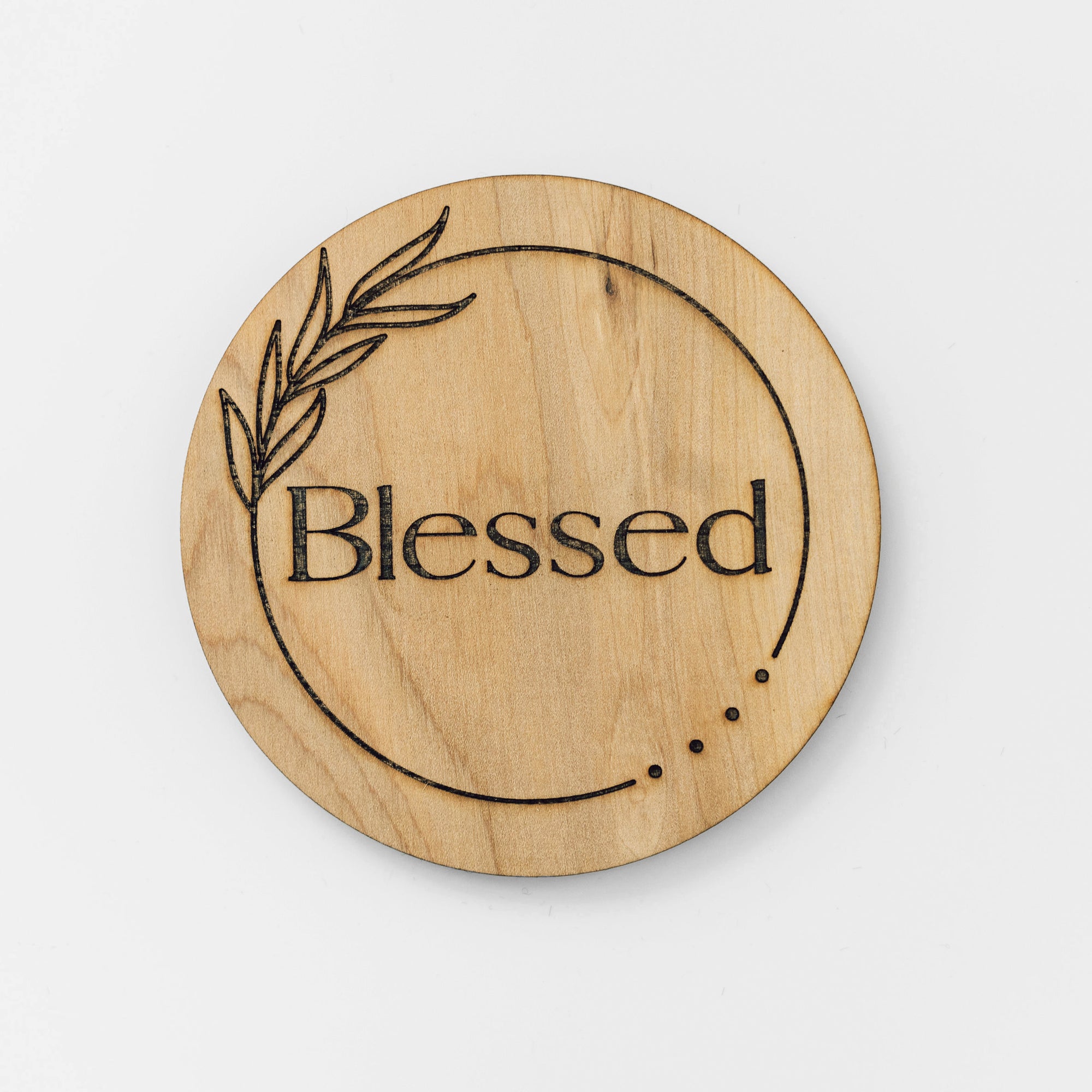 Engraved plaque disc for baby blessing.