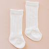 White socks for baby gift for special occasions.