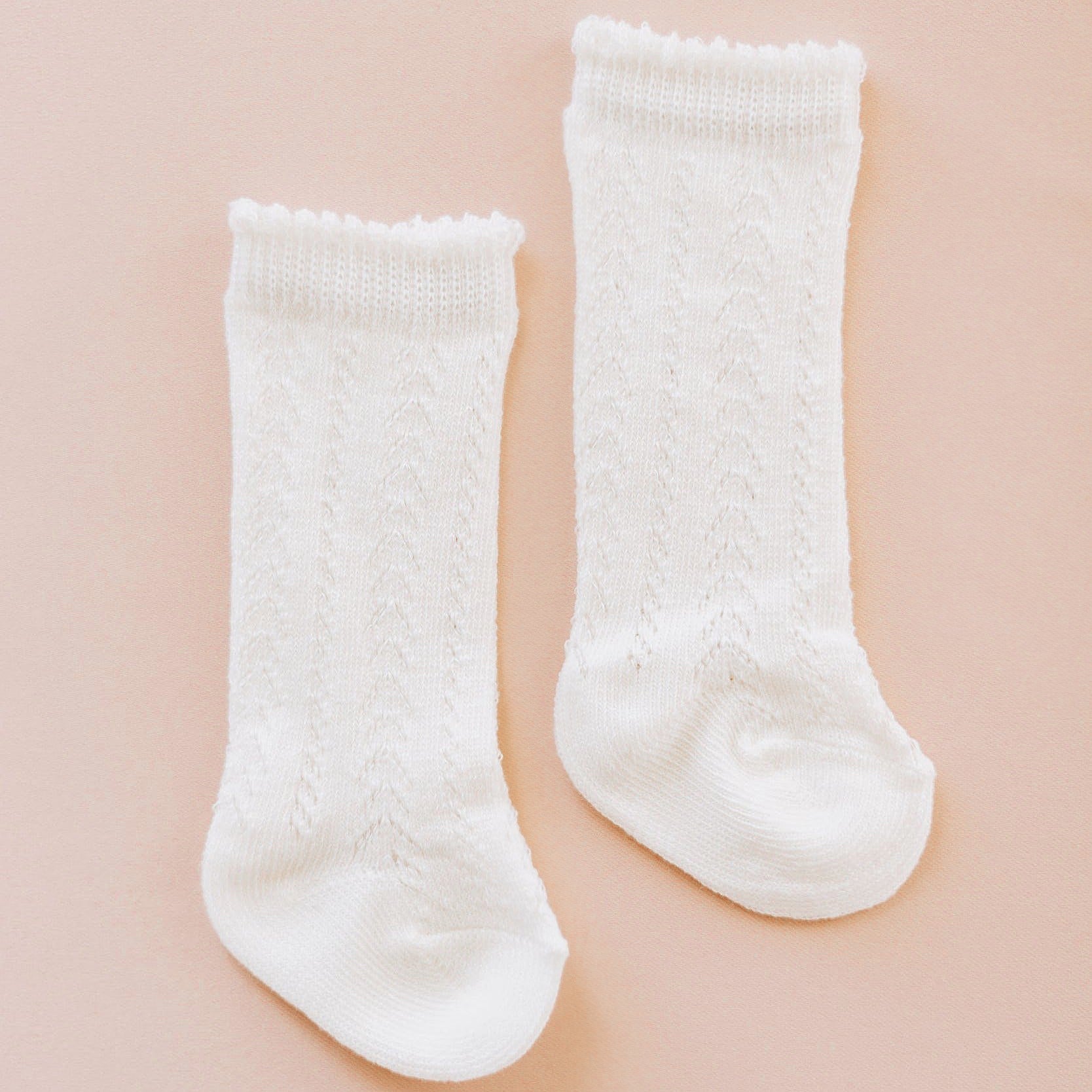 White socks for baby gift for special occasions.